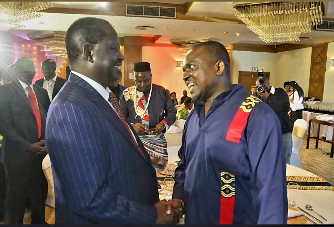File Image of the late former PM Raila Odinga and Mr. Victor Bwire, who is the Head of Media Development and Strategy at the Media Council of Kenya.